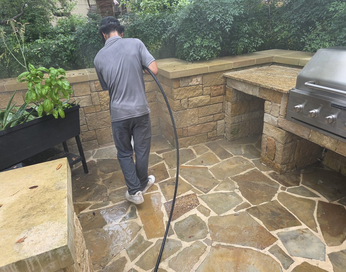 Washing a flagstone patio and outdoor kitchen