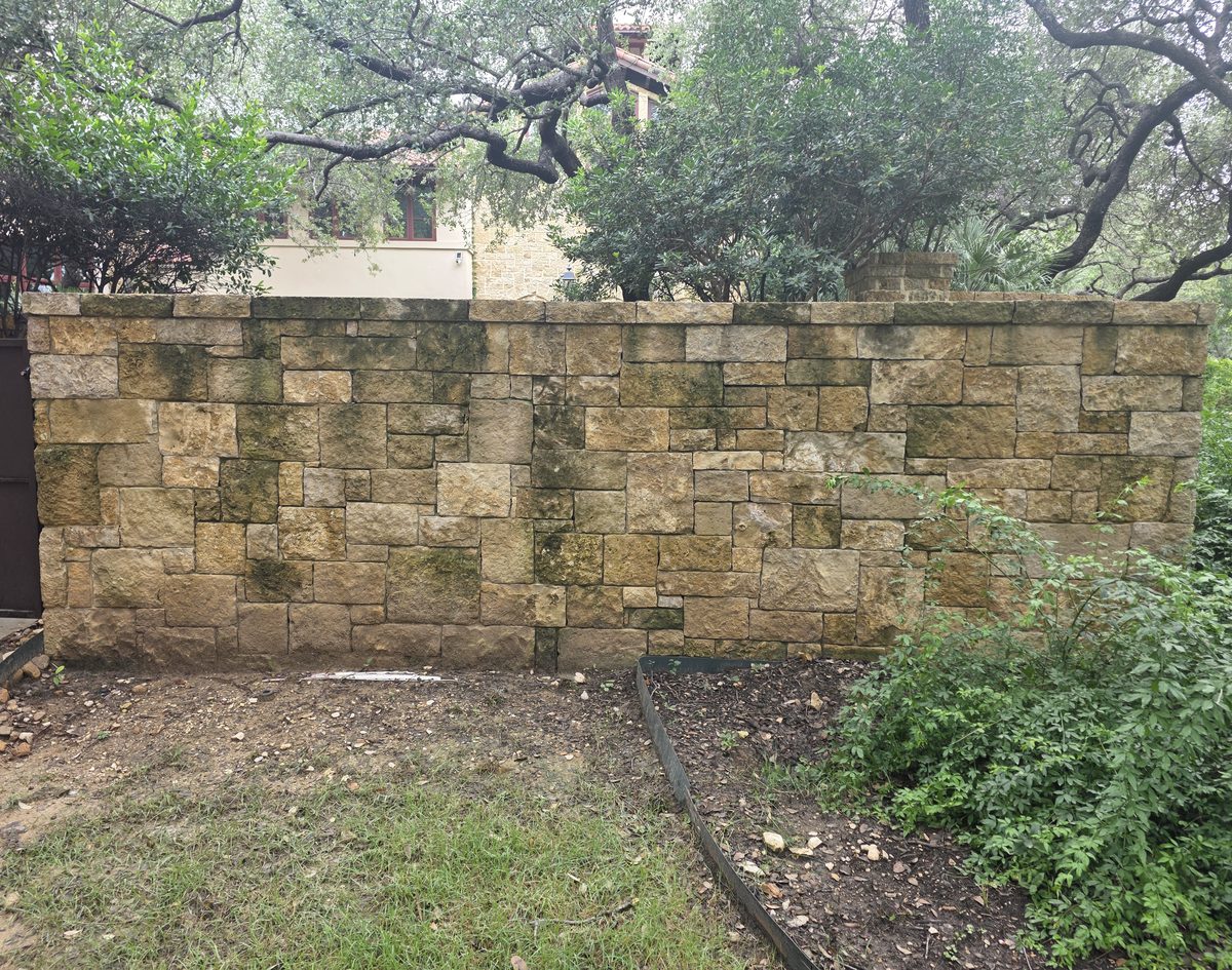 A stone wall before washing