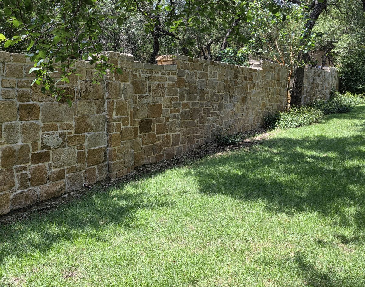 A long stone boundary wall